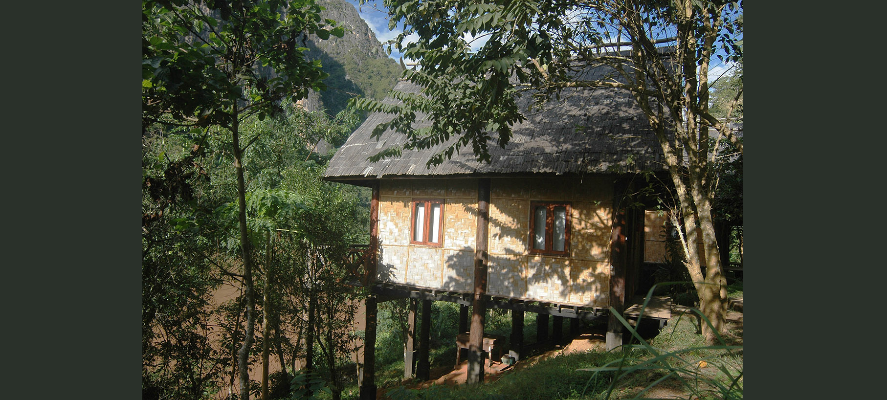 Cottage and trees Kong Khiaw